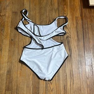 White tie close plus side one piece white with black trim